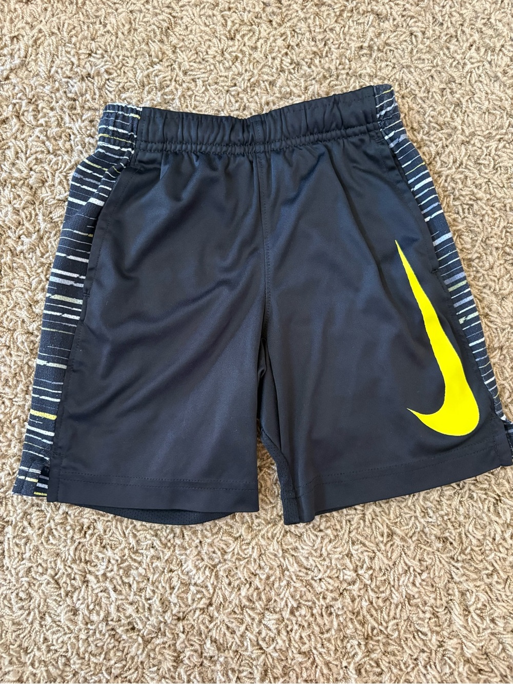 Nike Black Kids' Athletic Shorts with Yellow Swoosh and Striped Side Panels